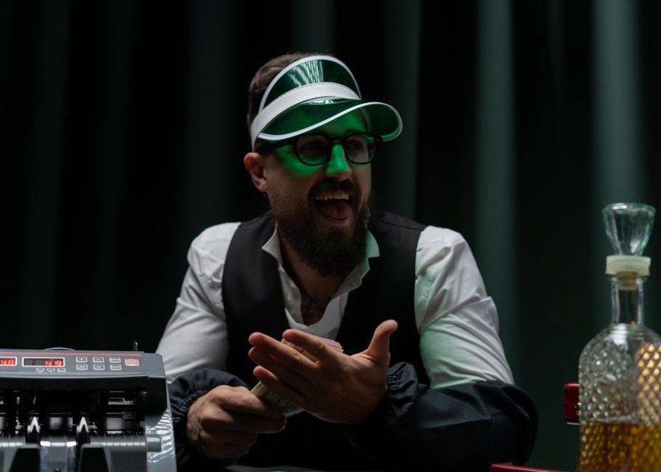 Man celebrating after winning at a casino game